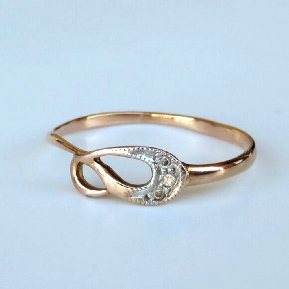 Elegant Twisted 14K Rose Gold CZ Ring. Size 7.25